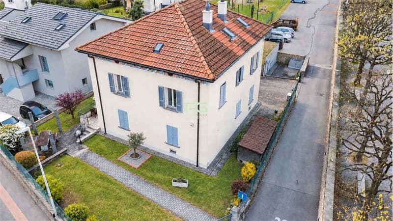 Casa bifamiliare con giardino in ottima posizione (2)