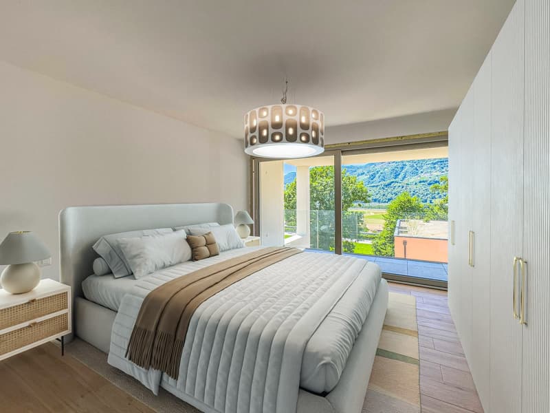 Slate grey bed with white linens, large windows with terrace, modern lamps, modern built-in closets, white furniture.