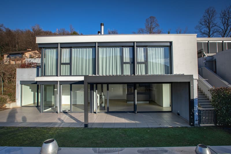 Oasi di prestigio a 10 minuti dal centro di Lugano: Moderno 3.5 locali con ampio giardino (7)