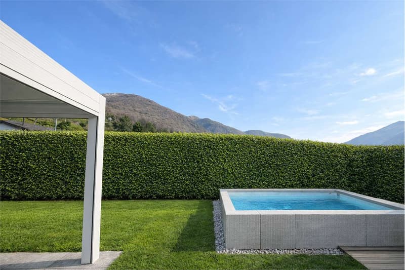 Elegante appartamento 5 locali con giardino privato a Bironico (7)