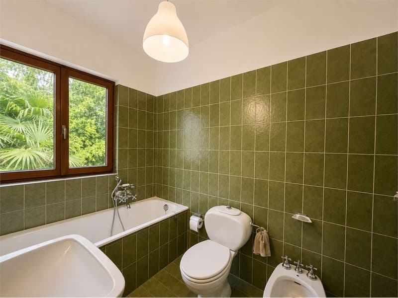 Villa bifamiliare con vista aperta e importante potenziale edificatori (11)