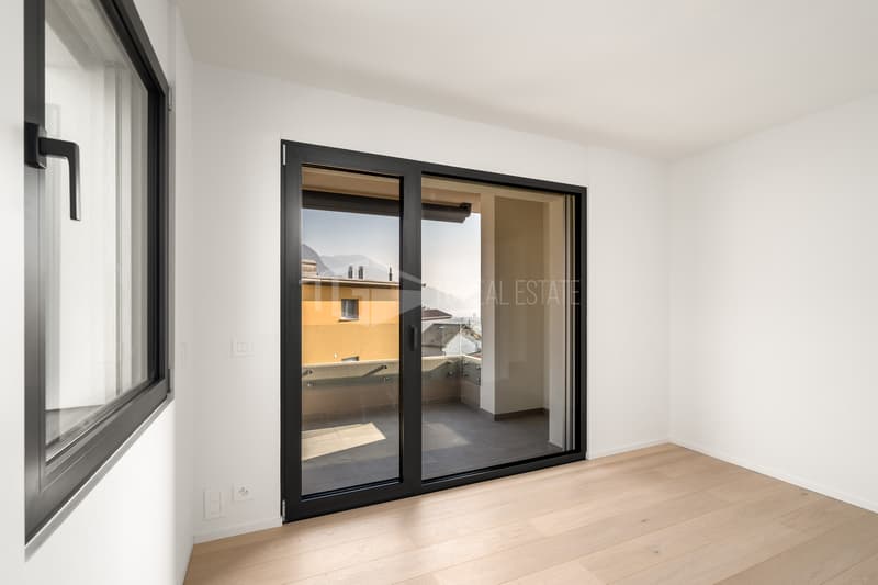 MODERNO ATTICO DI 4.5 LOCALI CON VISTA LAGO (5)