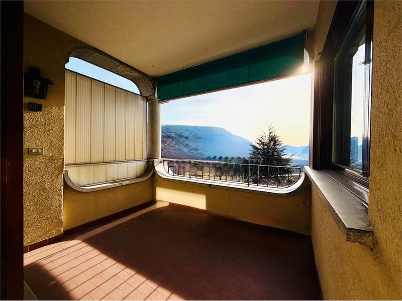 Lopagno -  ampio 2.5 locali con terrazza vista lago e piscina (2)