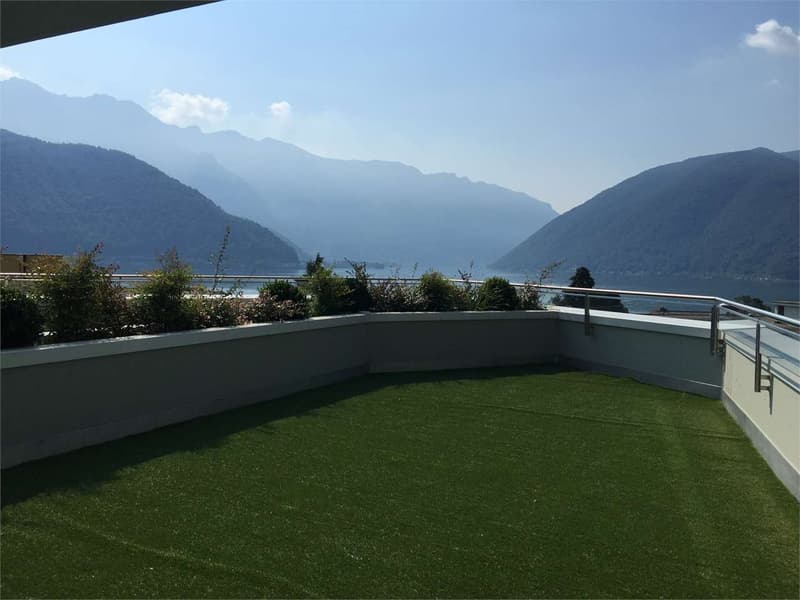 Melide - moderno 4.5 loc. con vista lago e roof-top (10)