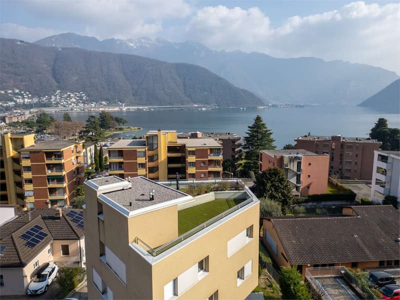 Melide - moderno 4.5 loc. con vista lago e roof-top (1)