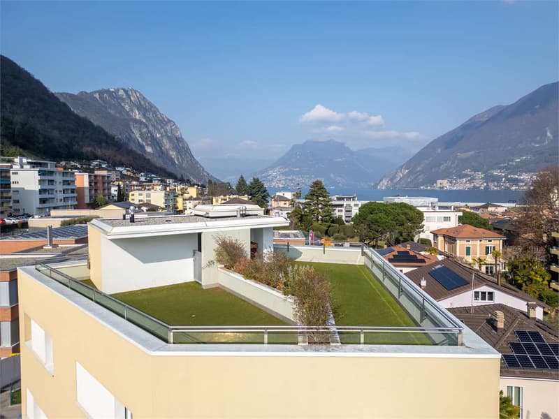Melide - moderno 4.5 loc. con vista lago e roof-top (11)