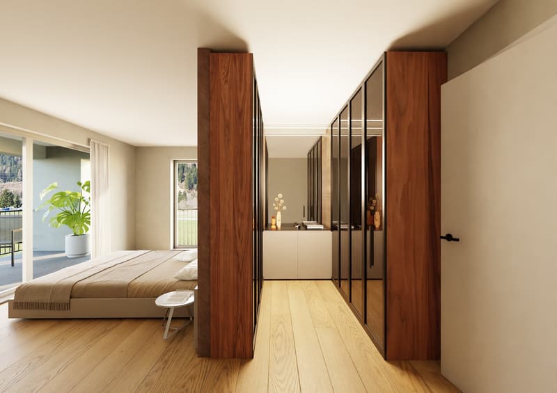 Master bedroom with a large bed, wooden flooring, sliding glass door leading to a balcony, modern wooden closets, minimalist decor.