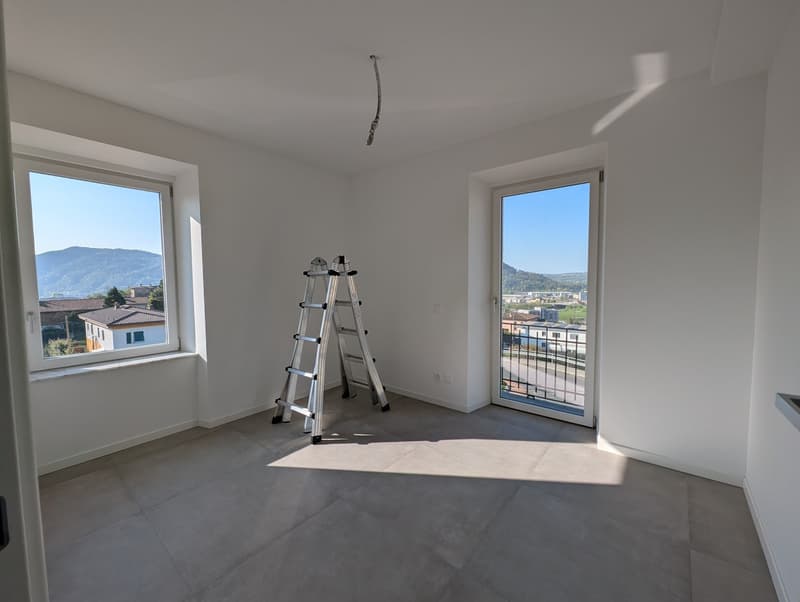 empty room, white walls, tiled floor, two large windows, ladder
