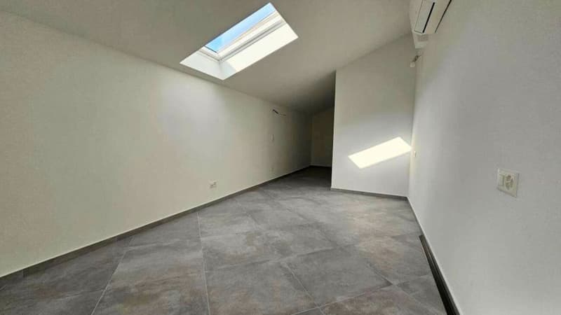 APPARTAMENTO MANSARDATO A CAPOLAGO (9)
