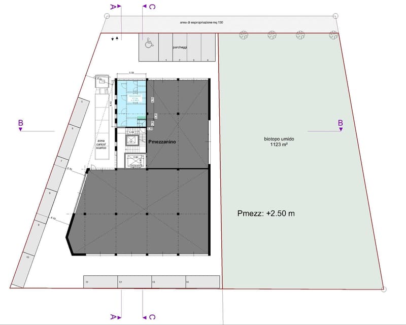 Plan with various rooms and open spaces, including zones marked as carico/scarico and Mezzanin.