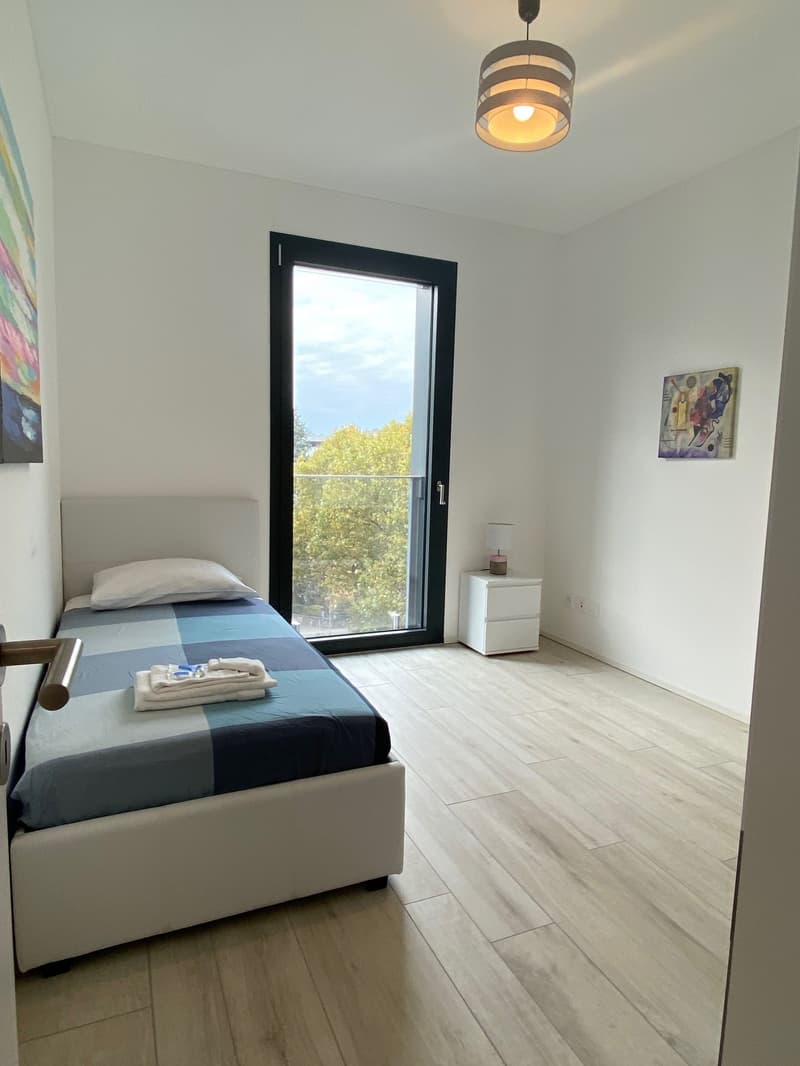 ELEGANTE 3.5 LOCALI ARREDATO CON PARCHEGGIO PRIVATO (7)