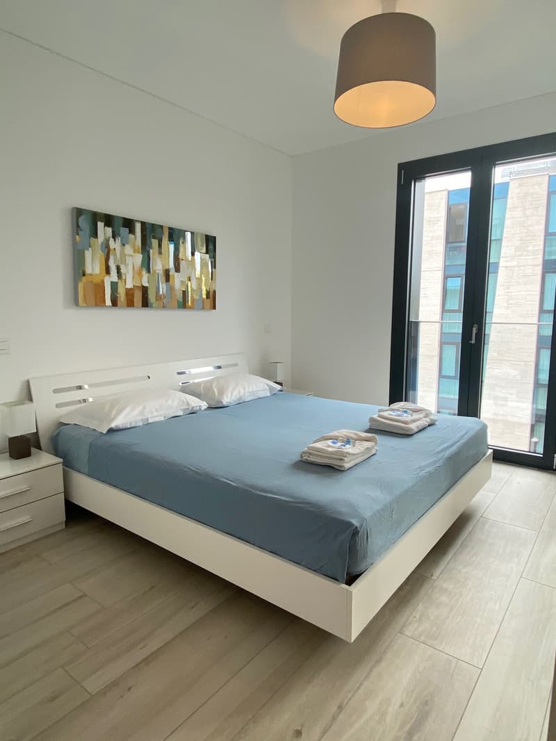 ELEGANTE 3.5 LOCALI ARREDATO CON PARCHEGGIO PRIVATO (10)