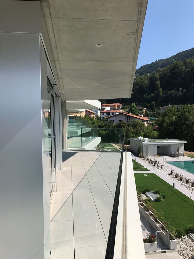 APPARTAMENTO 4.5 LOC. CON PISCINA MORBIO INFERIORE (13)
