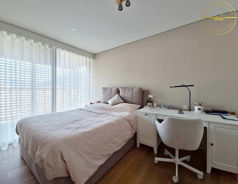 ELEGANTE APPARTAMENTO 3.5 LOCALI CON TERRAZZA E VISTA LAGO PARZIALE A PARADISO (12)