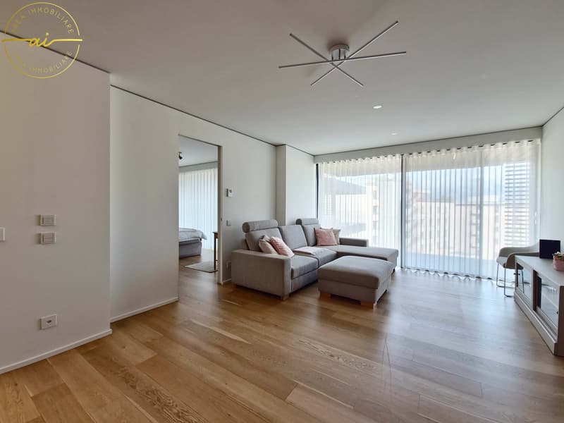 ELEGANTE APPARTAMENTO 3.5 LOCALI CON TERRAZZA E VISTA LAGO PARZIALE A PARADISO (2)