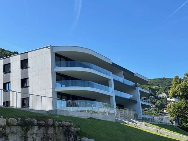 MONTAGNOLA-Nuovo app.2.5 con giardino e vista lago (8)