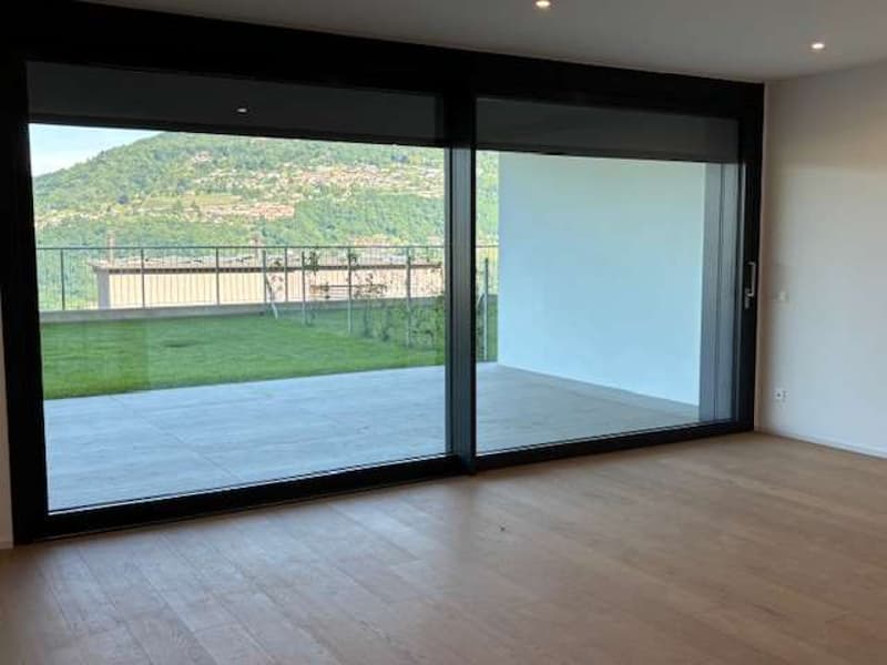 MONTAGNOLA-Nuovo app.2.5 con giardino e vista lago (3)