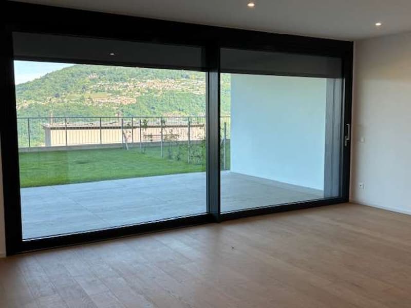 MONTAGNOLA-Nuovo app.2.5 con giardino e vista lago (7)
