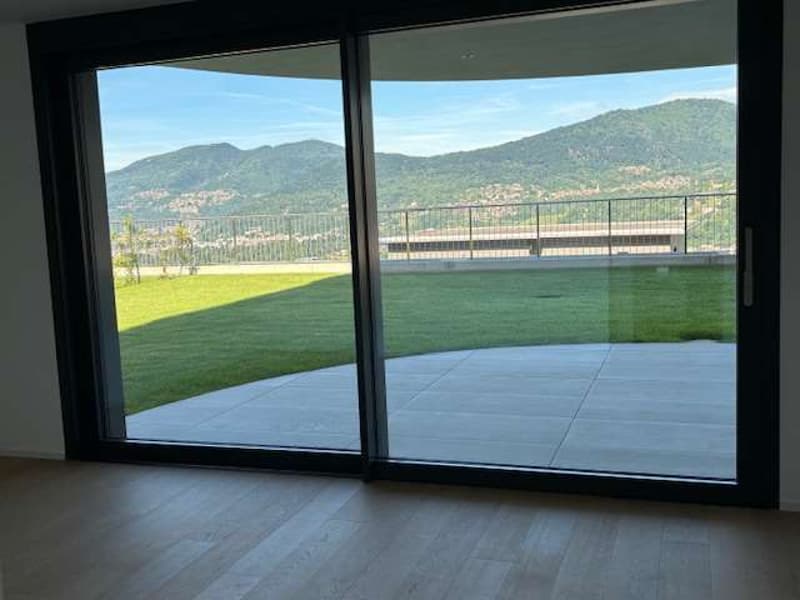 MONTAGNOLA-Nuovo app.2.5 con giardino e vista lago (5)