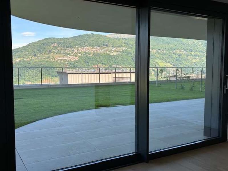 MONTAGNOLA-Nuovo app.2.5 con giardino e vista lago (4)