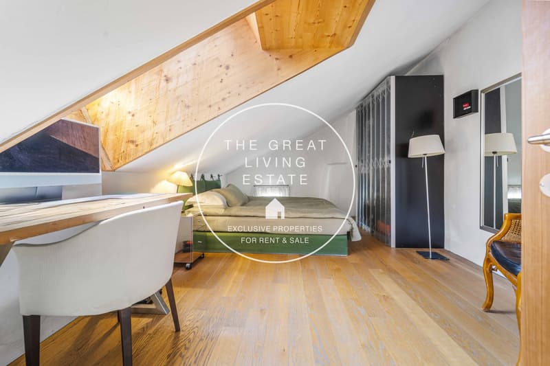 wooden floor, wooden ceiling, single bed, desk, white chair, floor lamp, wardrobe, radiator, mirror