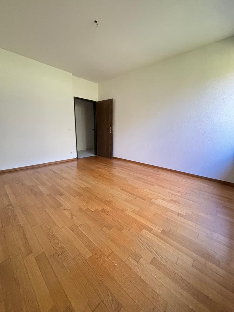 empty room, wooden floor, white walls, open door, doorway