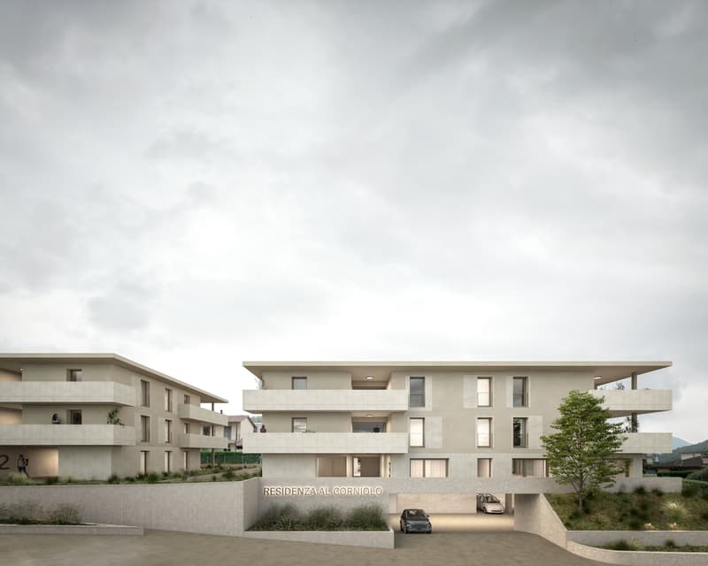 Modern apartment building, white exterior, multiple floors, balconies, parking area, greenery