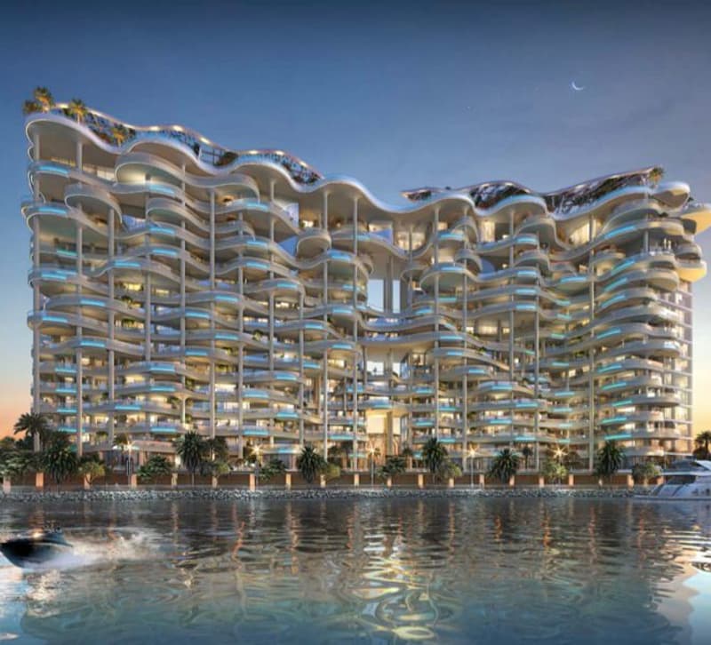 high-rise building with many balconies and windows, overlooking the waterfront, tropical plants, water reflections