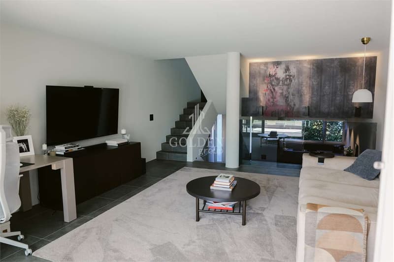 Elegante 3.5 locali su più livelli con giardino privato e accesso al g (10)