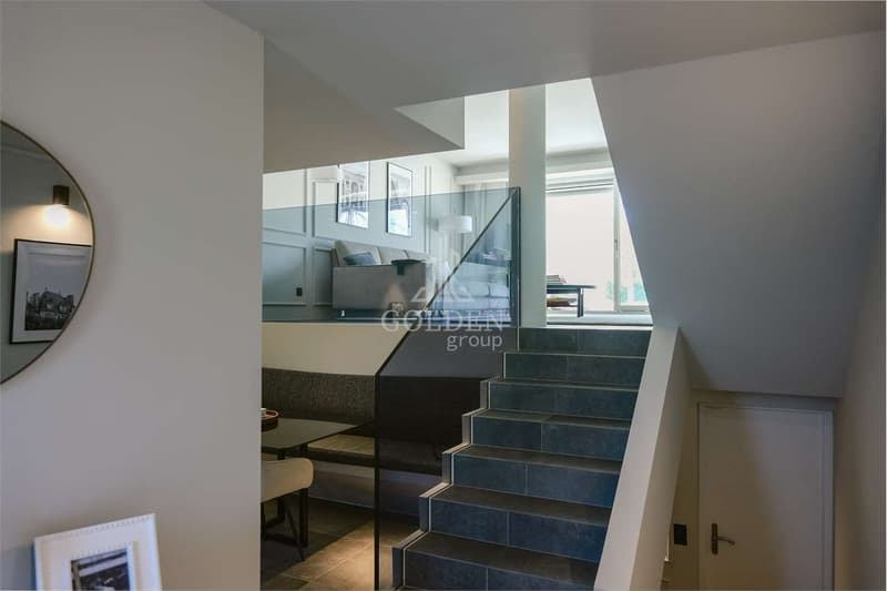 Elegante 3.5 locali su più livelli con giardino privato e accesso al g (2)