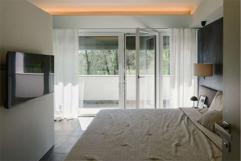 Elegante 3.5 locali su più livelli con giardino privato e accesso al g (12)