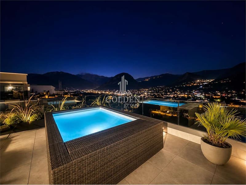 Attico con terrazza panoramica e piscina privata (10)