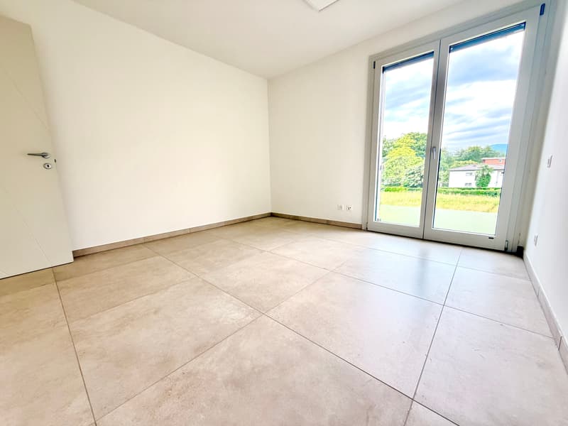 Moderno appartamento 2.5 locali ad Agno con vista panoramica (7)