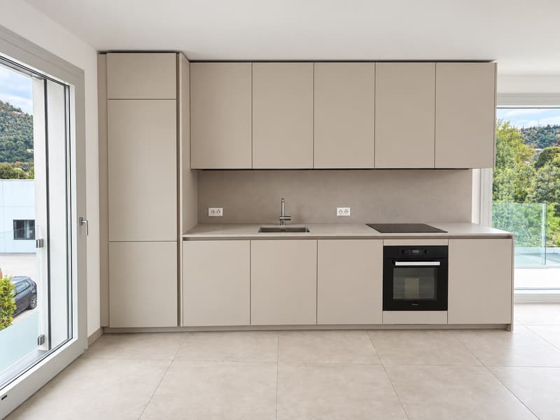 Moderno appartamento 2.5 locali ad Agno con vista panoramica (6)