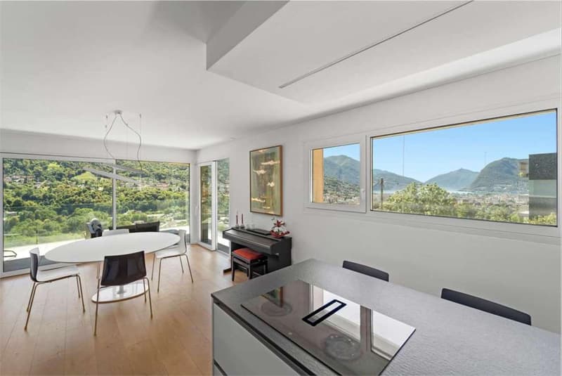 Il Tuo Rifugio di Design Vista Lago: Luce, Spazio e Modernità (6)