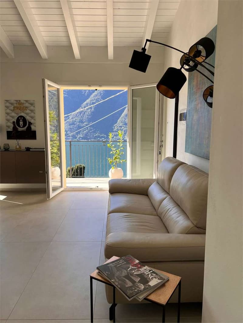 Elegante trilocale completamente arredato con terrazzo fronte lago (7)