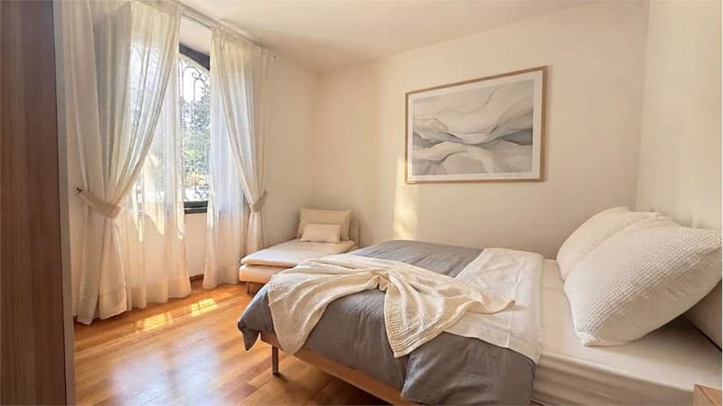 Incantevole Appartamento 2,5 locali con giardino e posto auto (8)