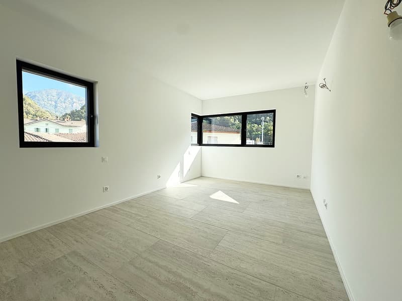 Elegante 4.5 locali al primo piano con terrazza e parziale vista lago (14)