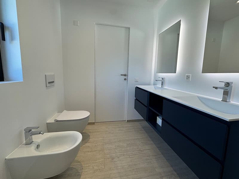 Elegante 4.5 locali al primo piano con terrazza e parziale vista lago (10)