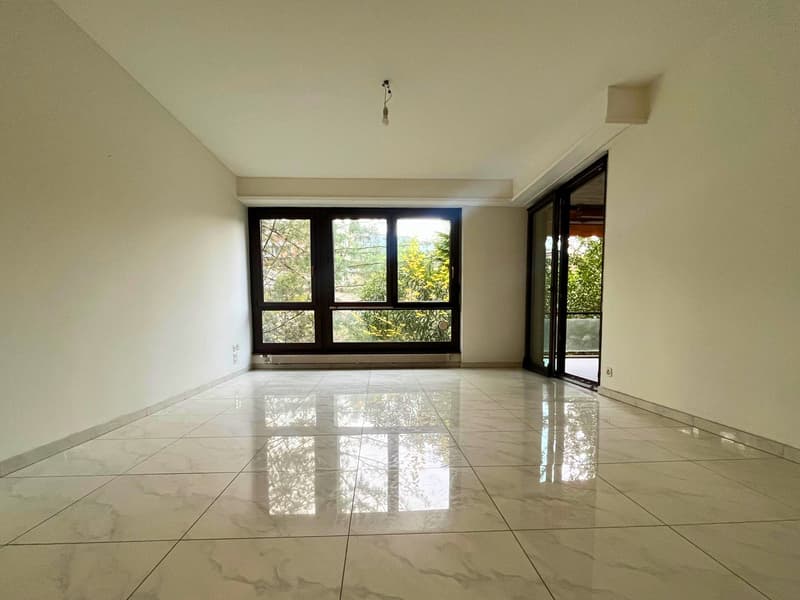 LUGANO LORETO – LUMINOSO 3.5 LOCALI CON AMPIA TERRAZZA, IMMERSO NEL VERDE (1)