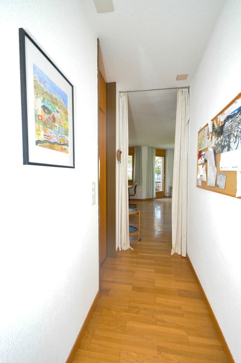 wooden floor, picture frame, bulletin board, curtains