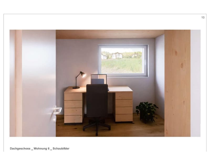Office area, wooden desk, window, greenery, wooden floors