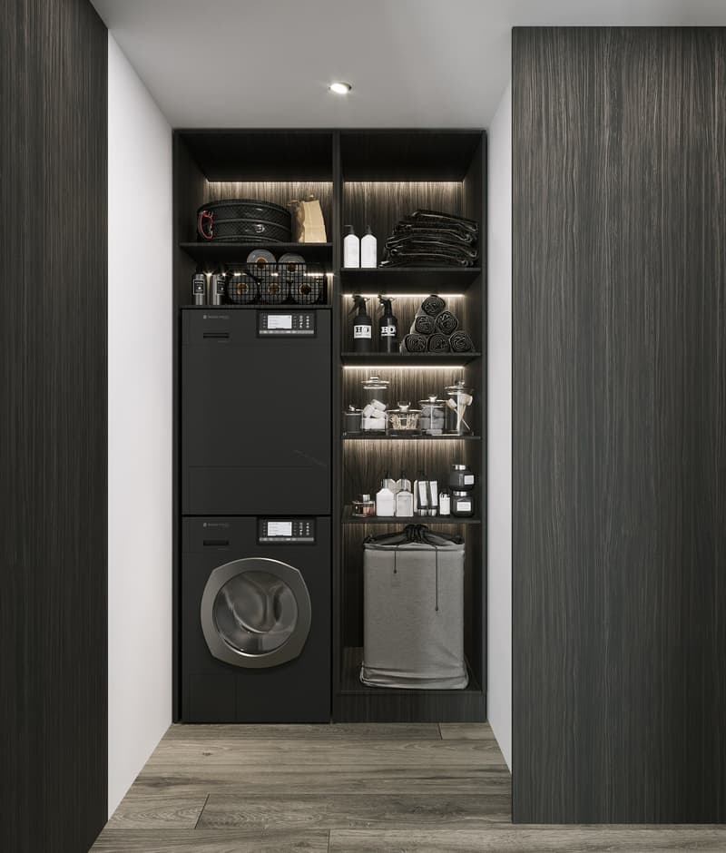 Compact laundry room with built-in washer and dryer, shelves with various household items, and a laundry basket