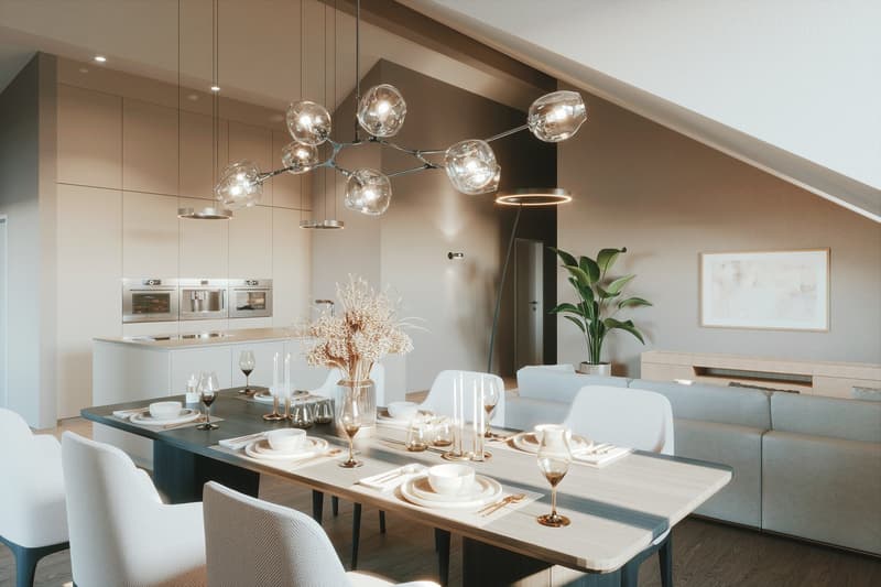 Dining area with a long table, modern chandelier, white chairs, and a couch. Kitchen with modern appliances and a countertop.