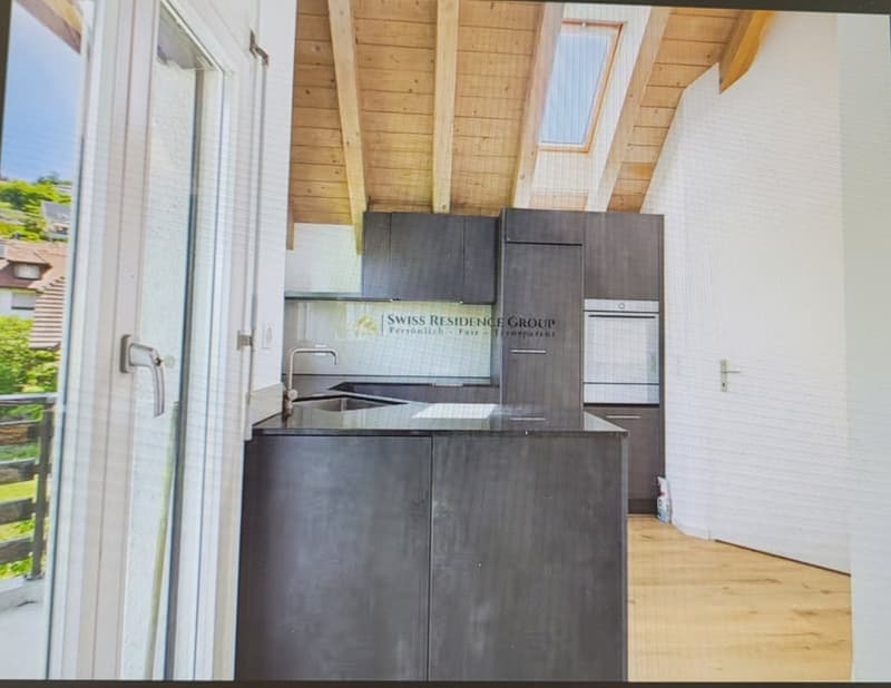 Charmante Dachwohnung mit Cheminée (5)