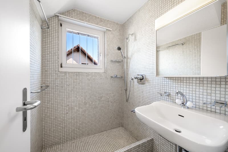small bathroom, white tiles, white sink, small window, shower