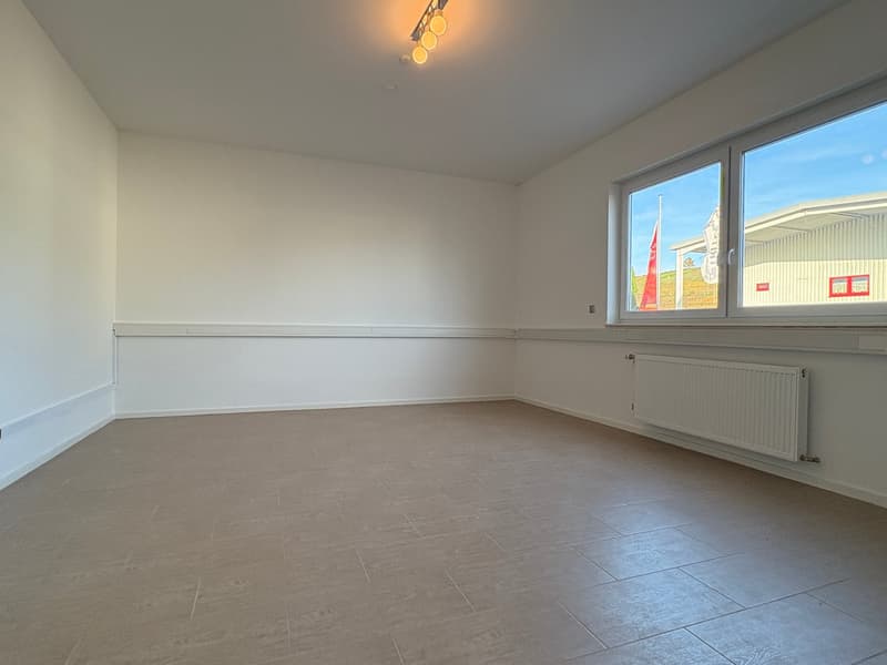 Empty room, white walls, tile flooring, radiator, large window