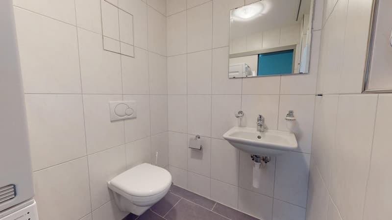 Attraktive 3,5-Zi.-Wohnung mit Balkon, Lift und Tiefgarage in zentraler Lage von Laufen (10)