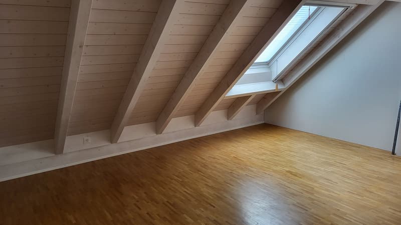 wooden ceiling beams, wooden floor, window, skylight