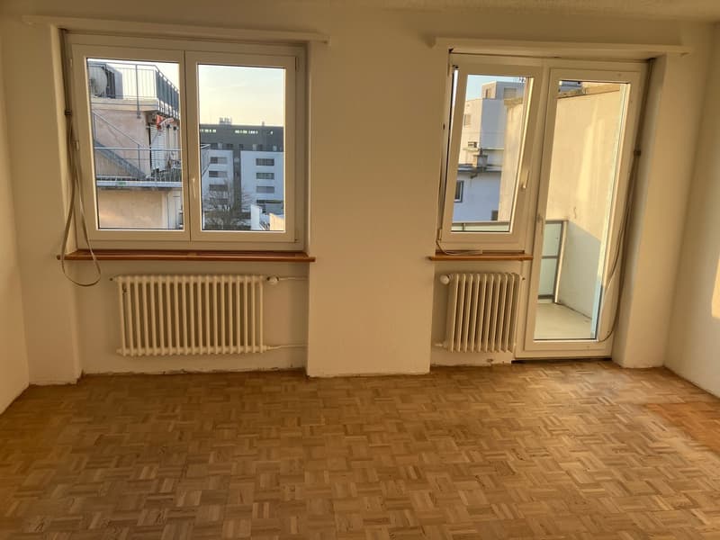 2 windows, wooden parquet floor, heating radiators, balcony